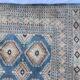 Tapis oriental fait main xxeme fond bleu 307 cm x 222 cm