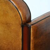 Sheepskin Art Deco design armchair with wood and beautiful cognac-colored leather