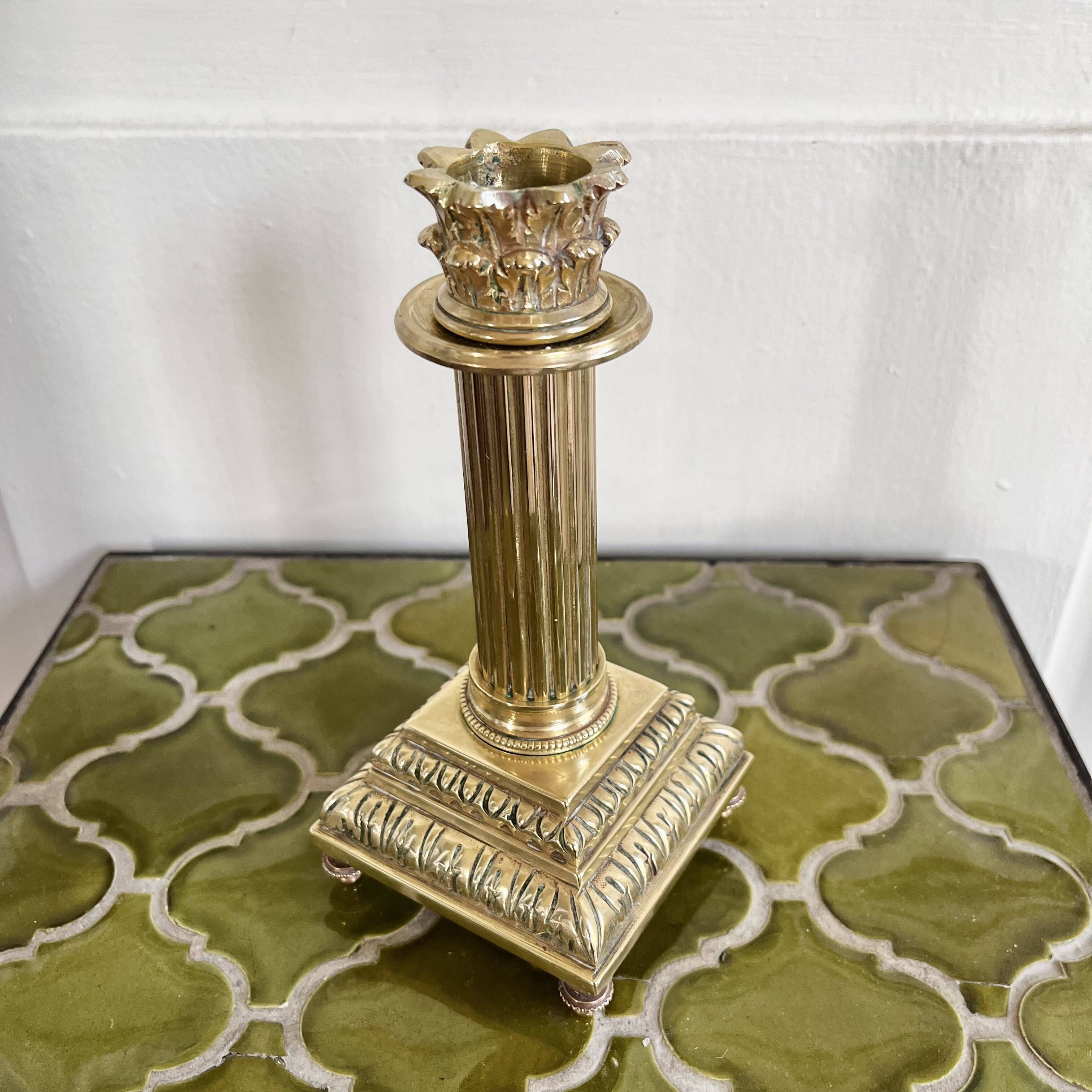 Empire style gold candle holder