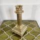 Empire style gold candle holder
