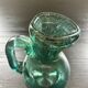 Bluish blown glass carafe