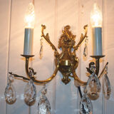Old brass sconce with glass drops