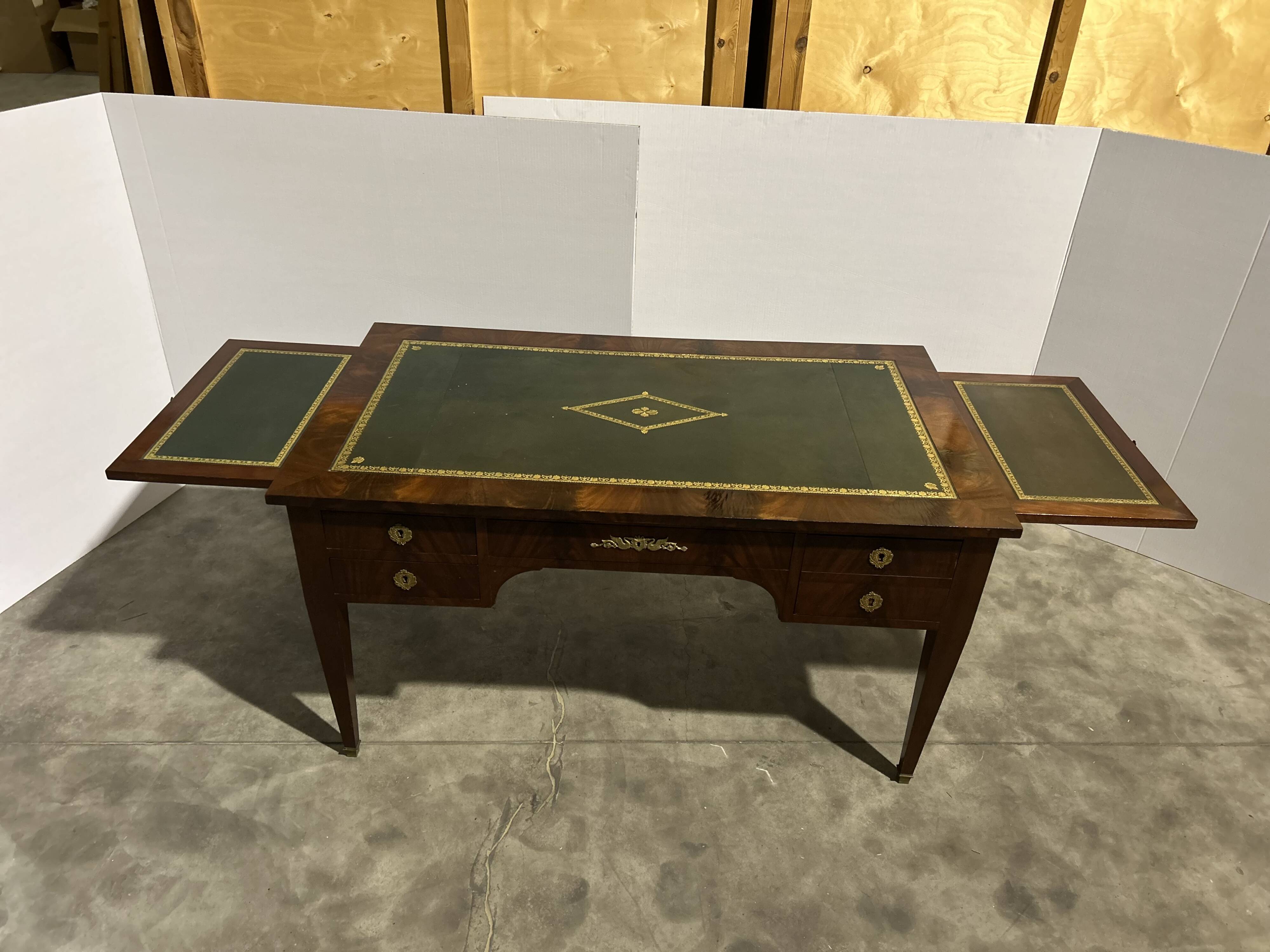 Mahogany flat desk. Louis XVI style, 20th century.