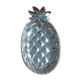 Silver-plated metal tray in the shape of a pineapple.