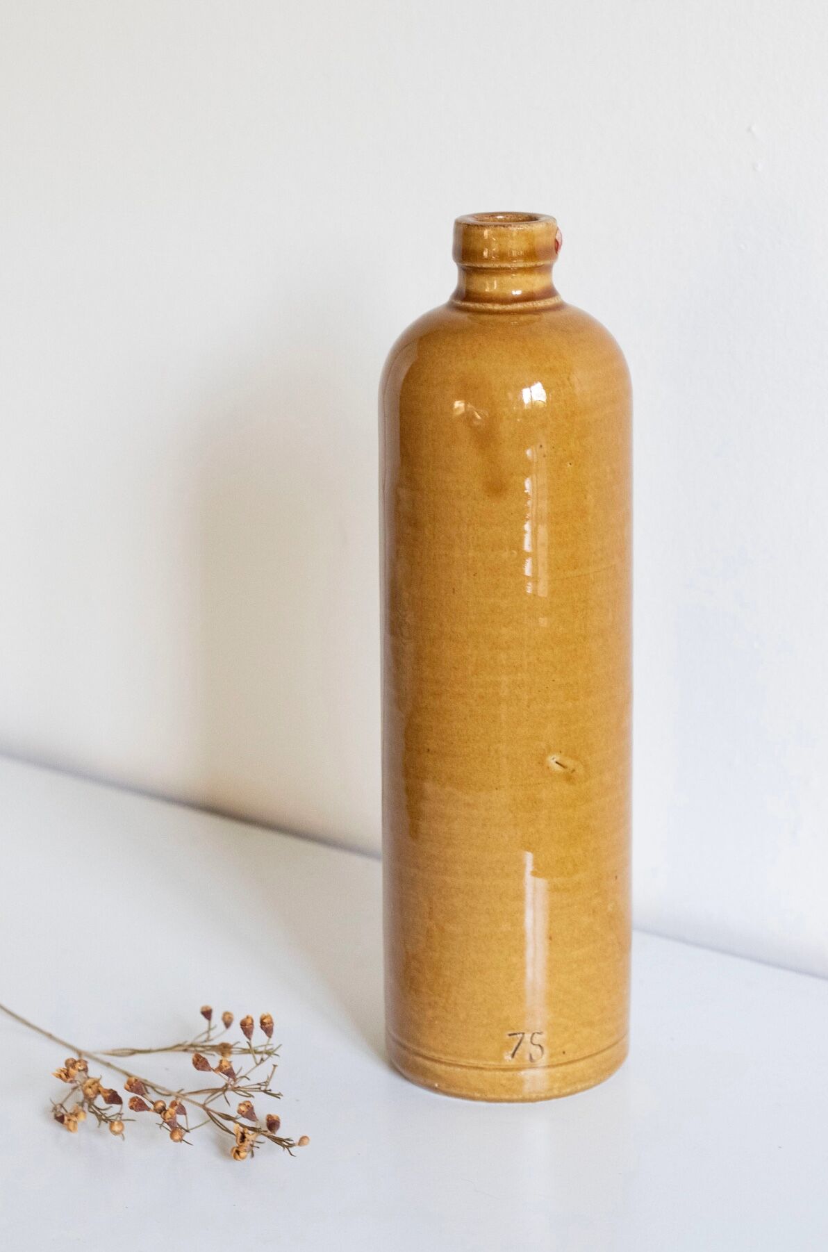 Enamelled stoneware bottle