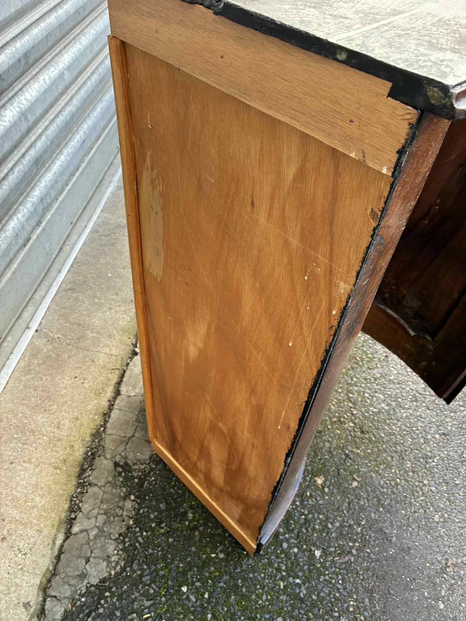 Small wooden corner accent table.