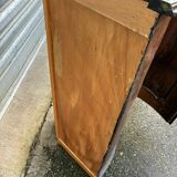 Small wooden corner accent table.