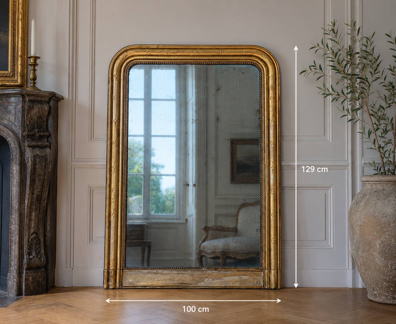 Large gilded Louis-Philippe antique mirror from the 19th century with original glass, measuring 129 x 10 cm.