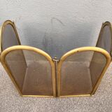 Antique brass fireplace screen from 1920, vintage spark guard.