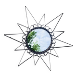 Old wrought metal sun mirror