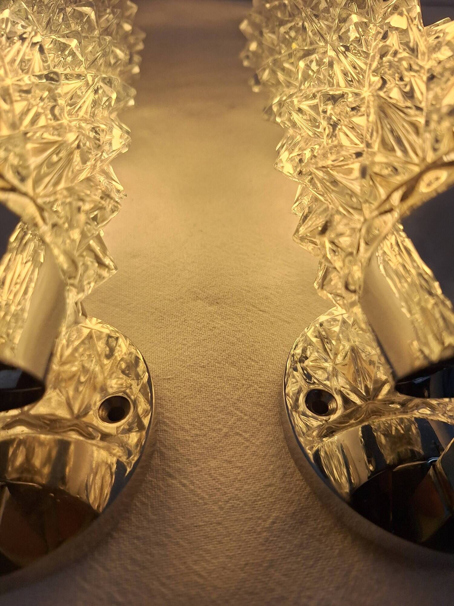 Pair of vintage Art Deco space age chrome and molded glass wall sconces