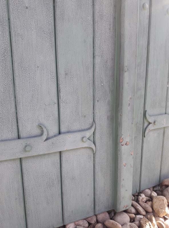 Pair of wooden iron hanging shutters