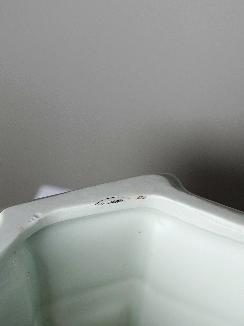 Square cache-pot with feet in celadon Limoges porcelain, Rococo style.