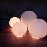 White glass globes and light string