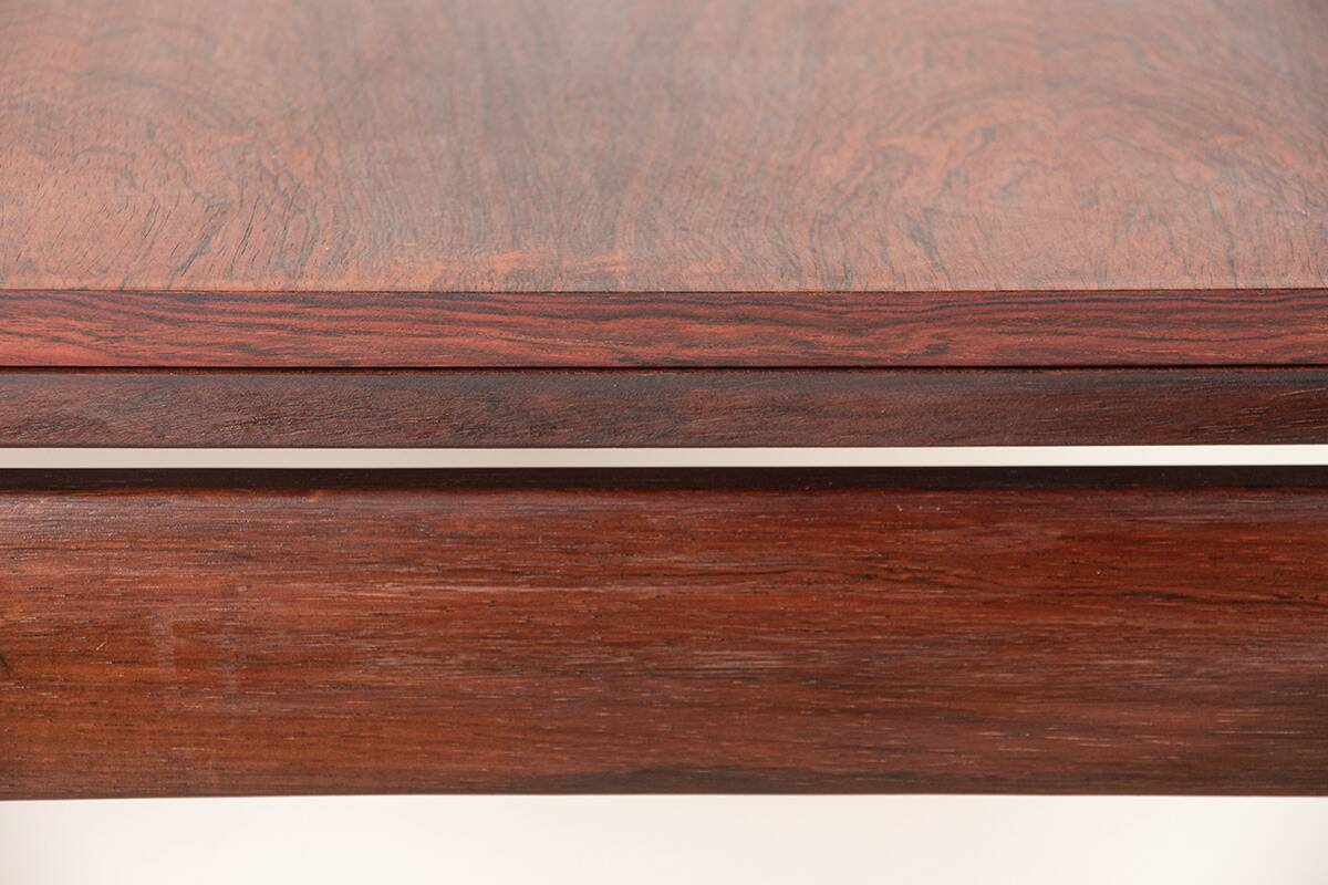 Danish extendable dining table in rosewood and brass by Poul Volther