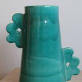 Handmade ceramic abstract vase with large handles and turquoise blue flowers