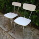 Pair of veined fomica chairs 60
