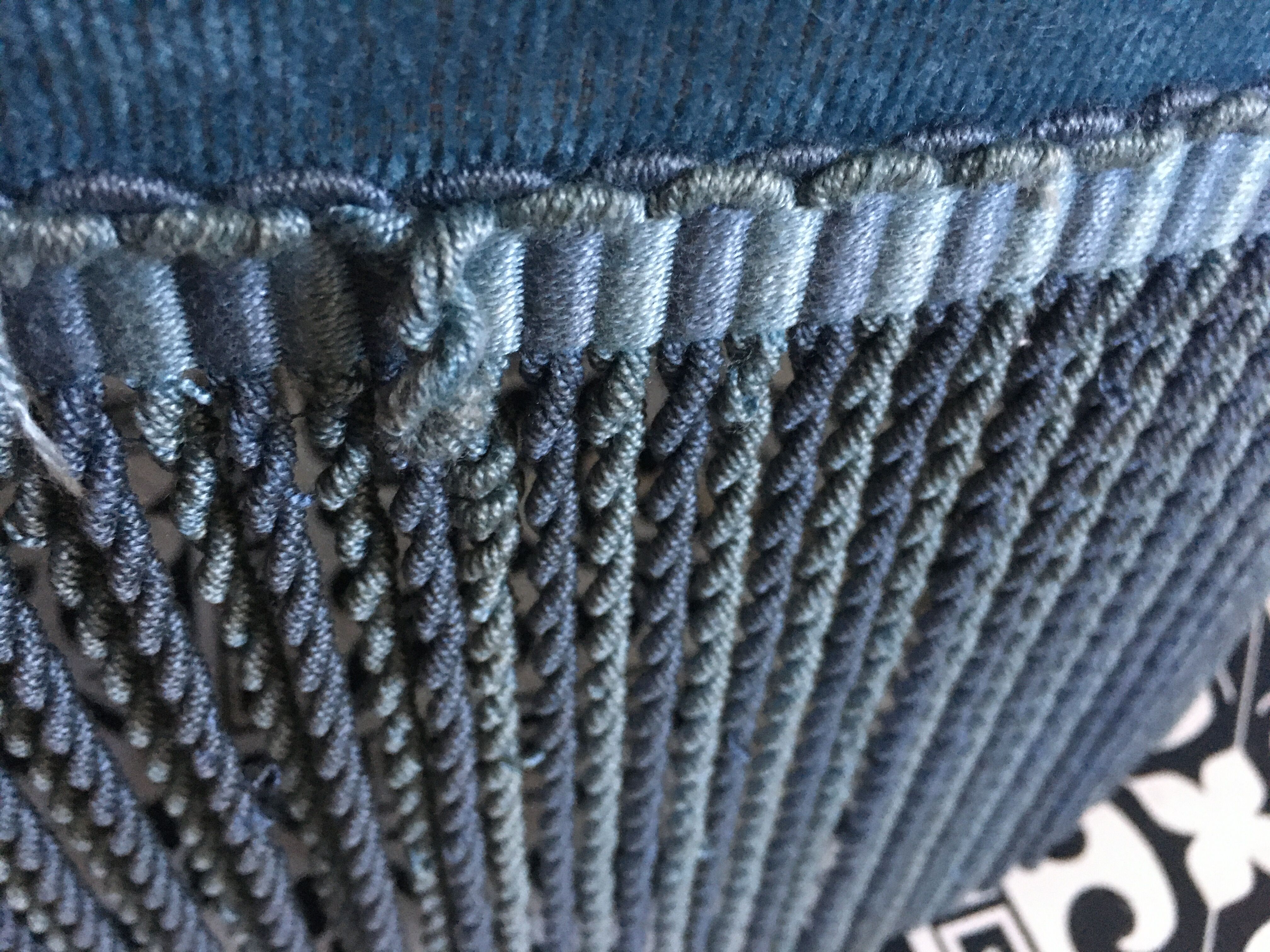 Blue heater with fringed medallion shape