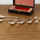 Set of 6 silver metal dessert spoons