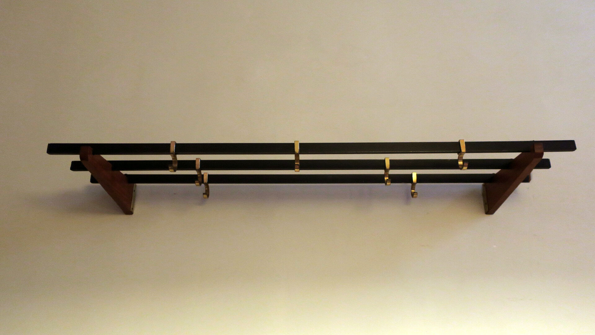Teak, brass and black metal coat and hat rack, 1960