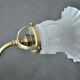 Brass gooseneck wall lamp and tulip lampshade