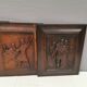 Four old wooden carvings to hang on the wall.