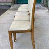 6 Italian Scandinavian style dining chairs from the 1950s in wood and leather.
