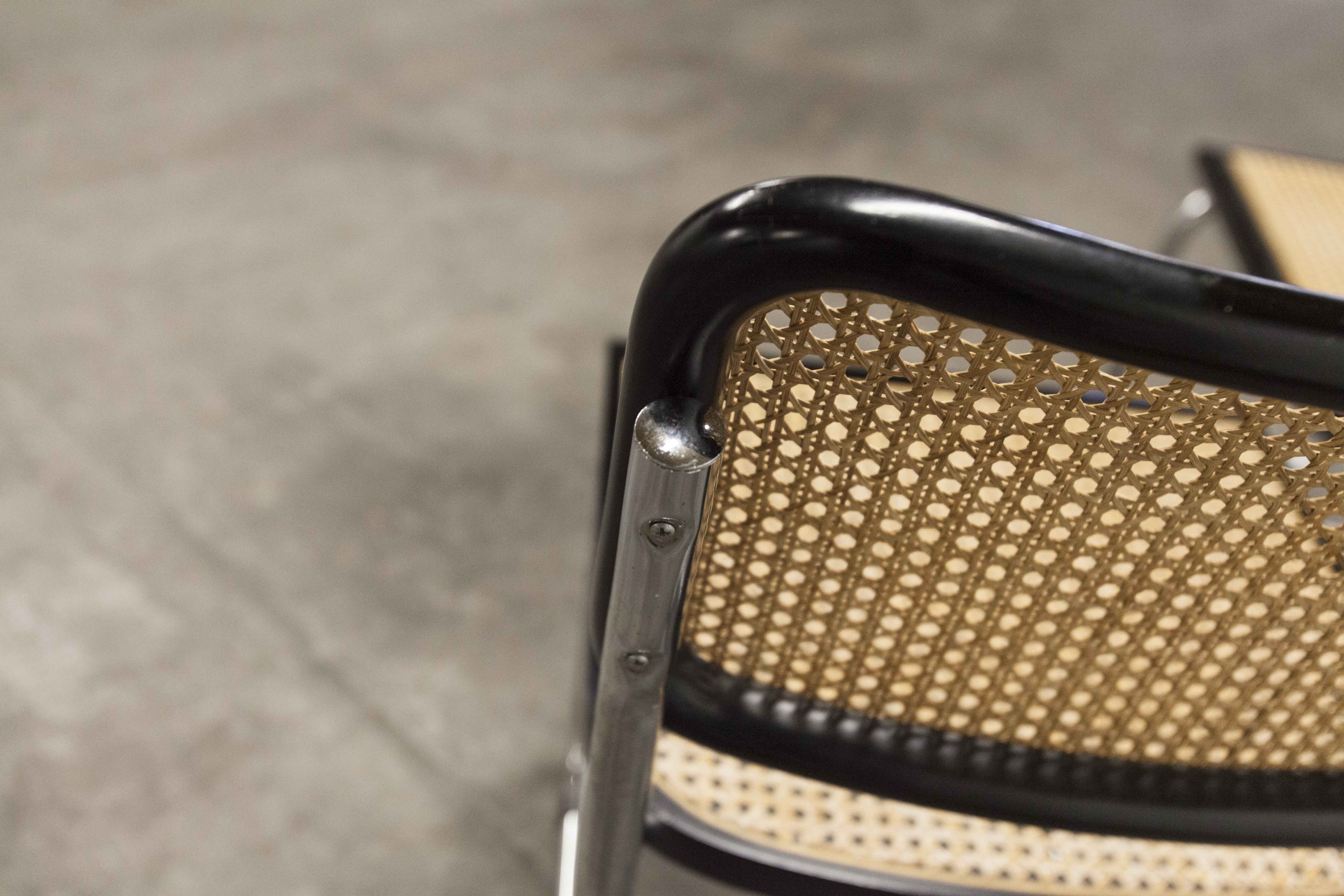 Pair of black Breuer b32 chairs and cannage