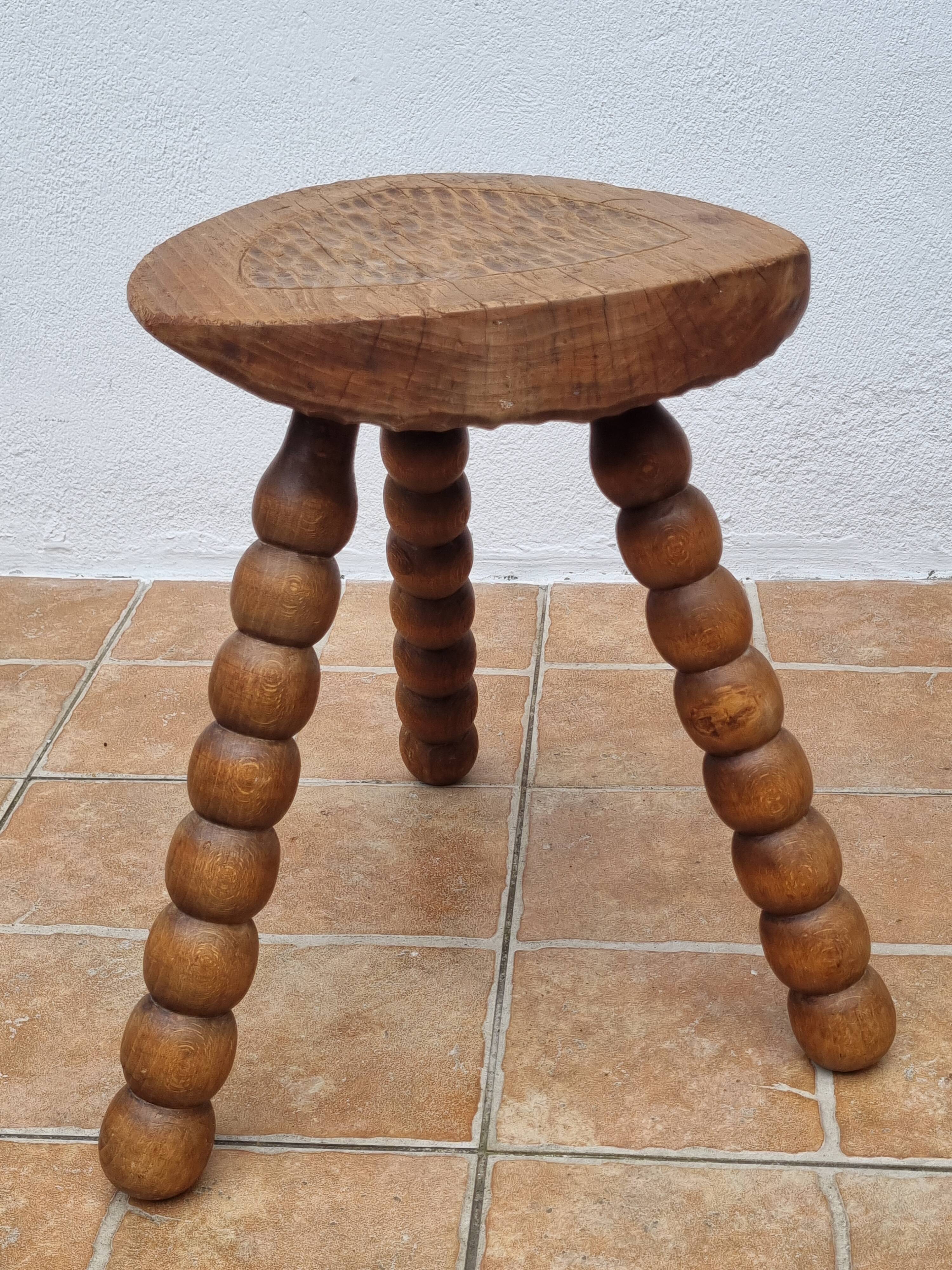Rustic solid wood tripod stool with turned legs, 45 cm high