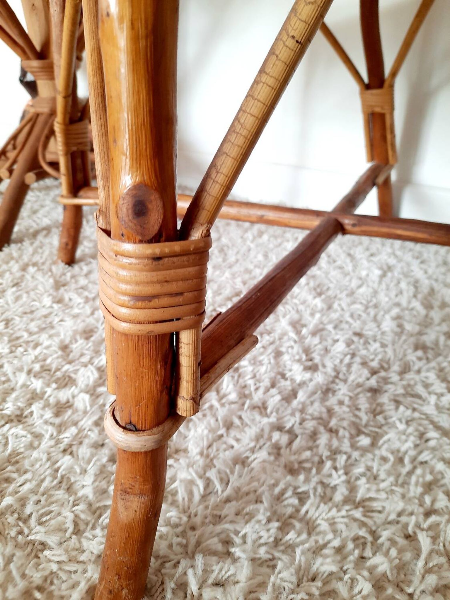 1950s 60s rattan armchair with green apple and black piping.