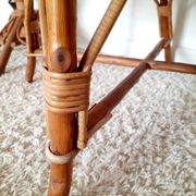 1950s 60s rattan armchair with green apple and black piping.