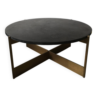 Round coffee table with a metal base and a blue stone top.