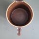 Pitcher - cream pot - in brown glazed earthenware