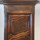 Antique Louis XV bonnetière in carved walnut – Late 18th century