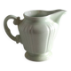 Green ceramic milk jug