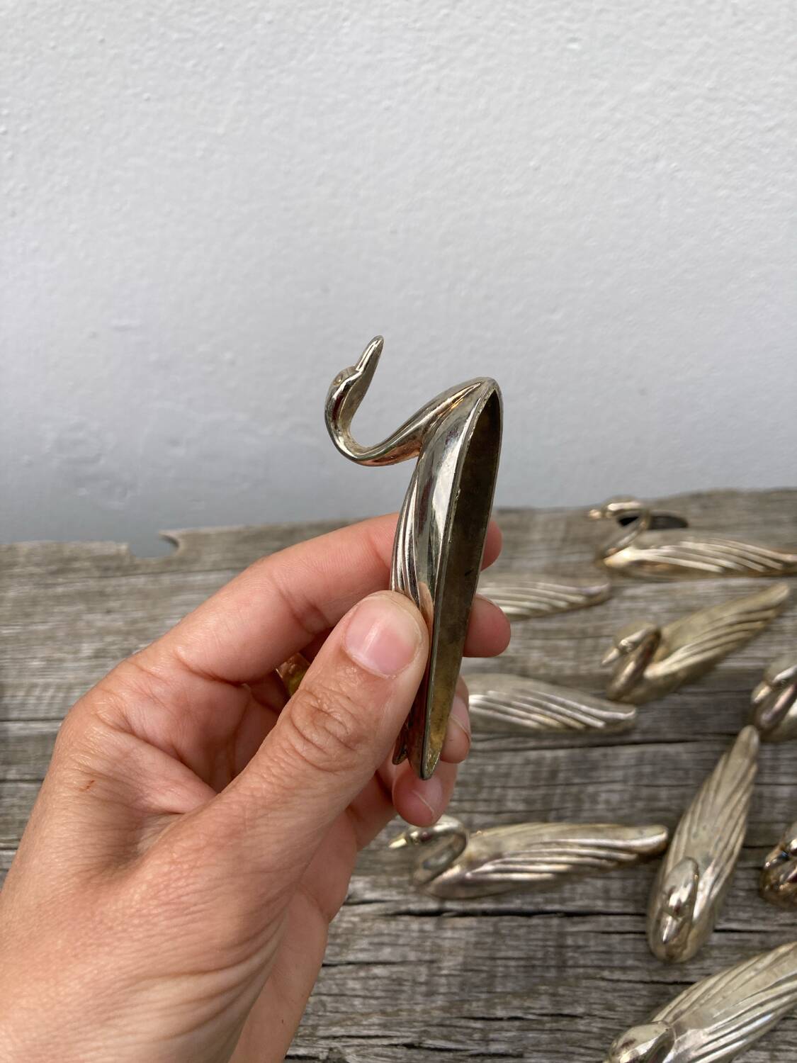 12 duck knife holders in silver metal