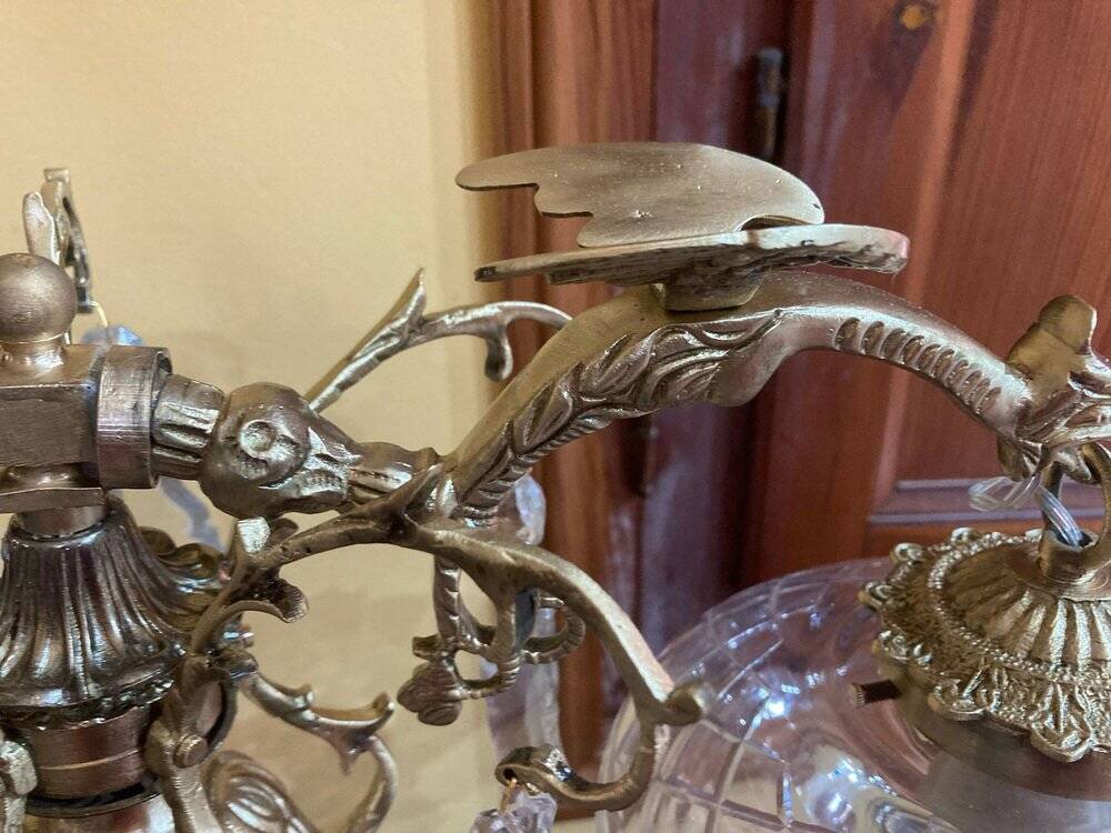 Bronze table lamp with dragon arm and cut glass shade, 1940s
