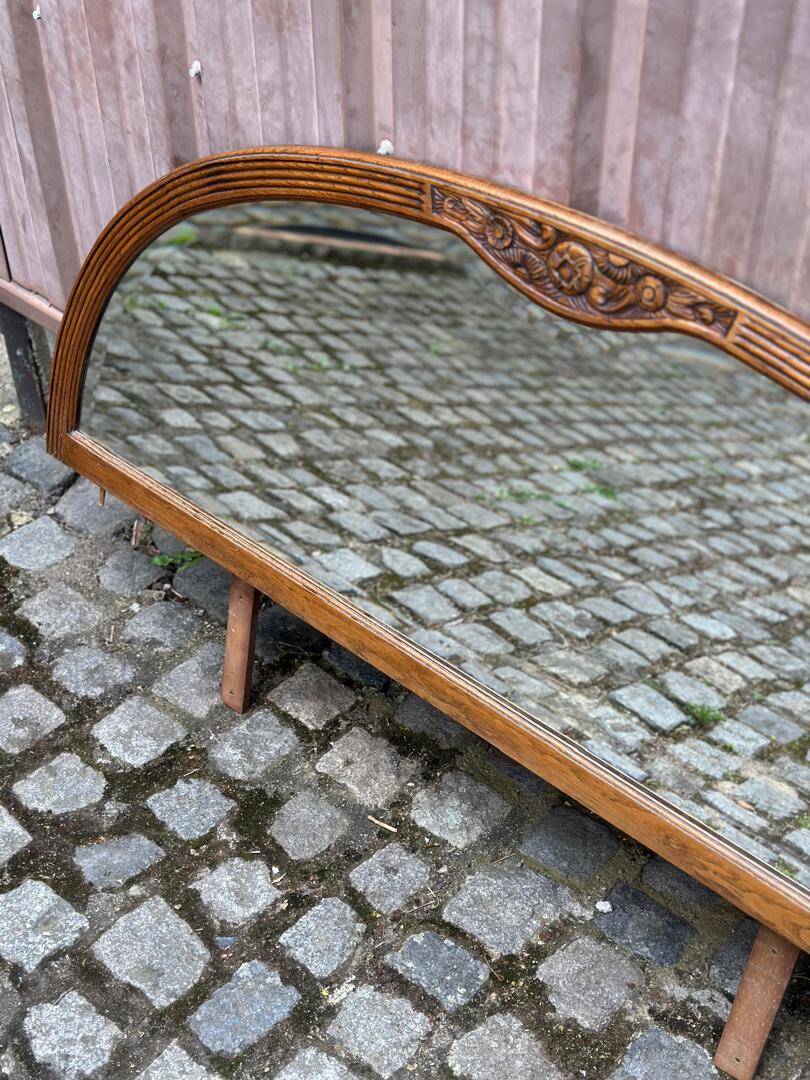 Art Deco concave mirror, arc-shaped, carved in solid wood, 1940.