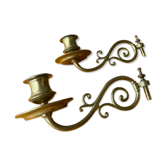 Pair of bronze and brass piano candle holders