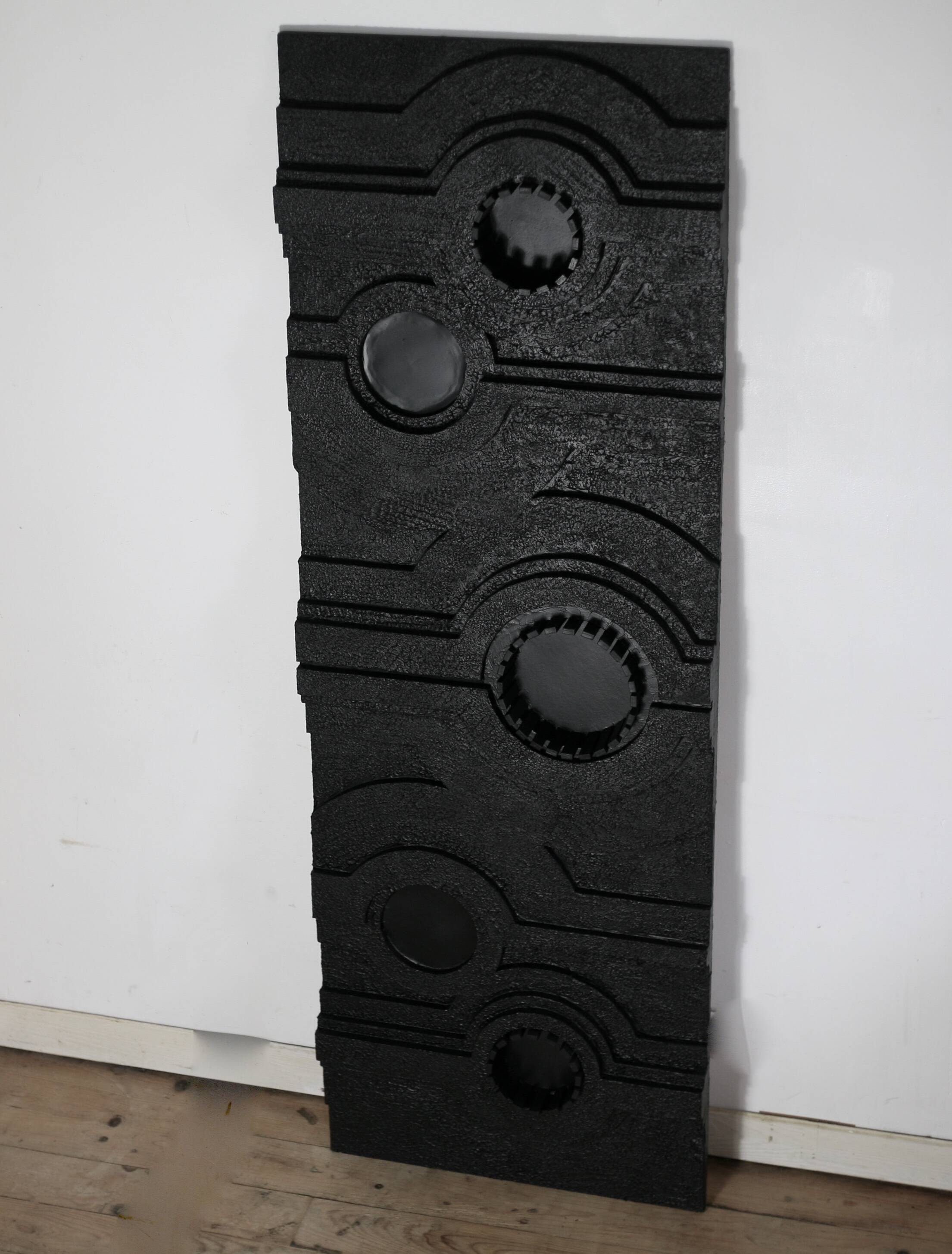 Wall sculpture, wood and black coating, late 1970s