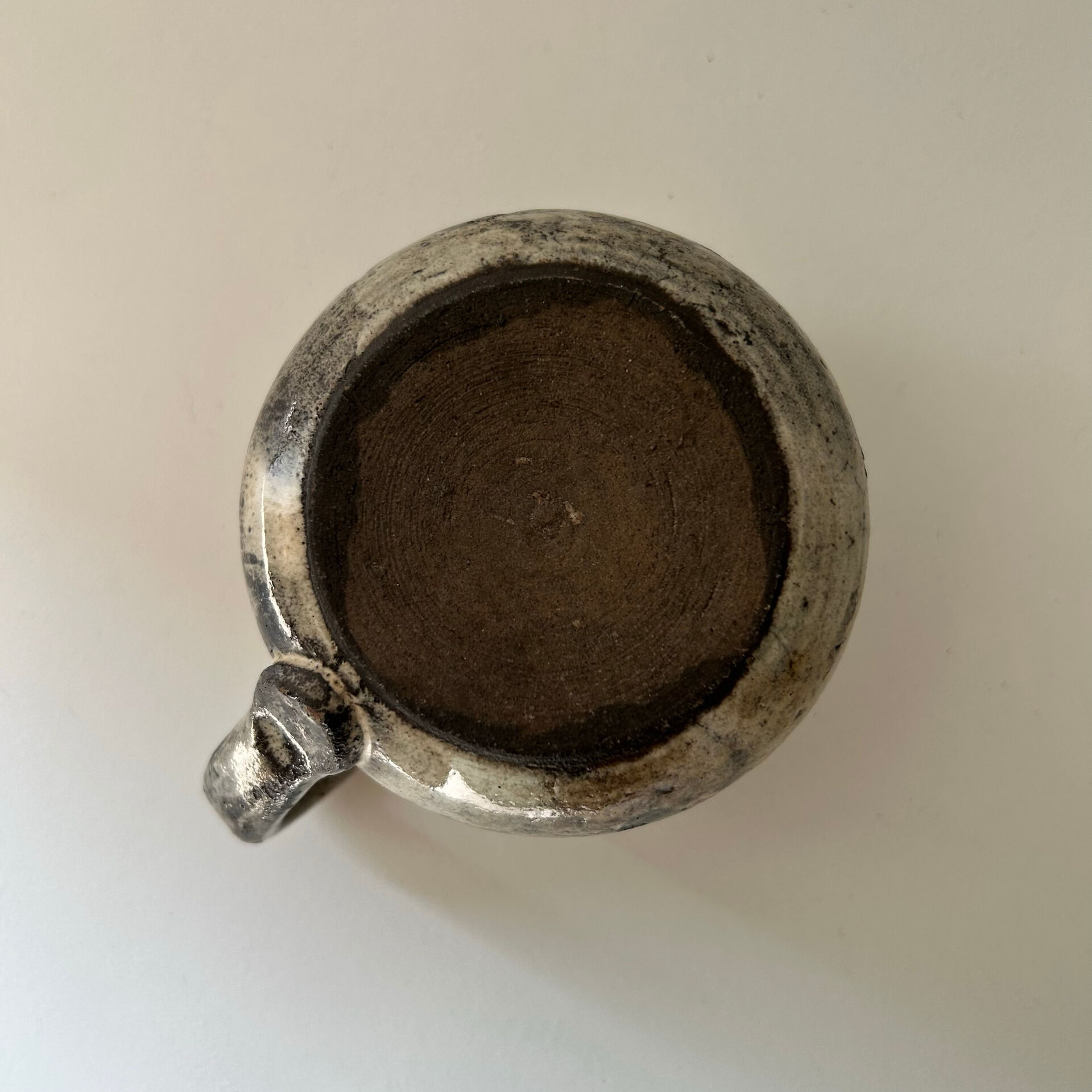 Handcrafted mug with floral decoration