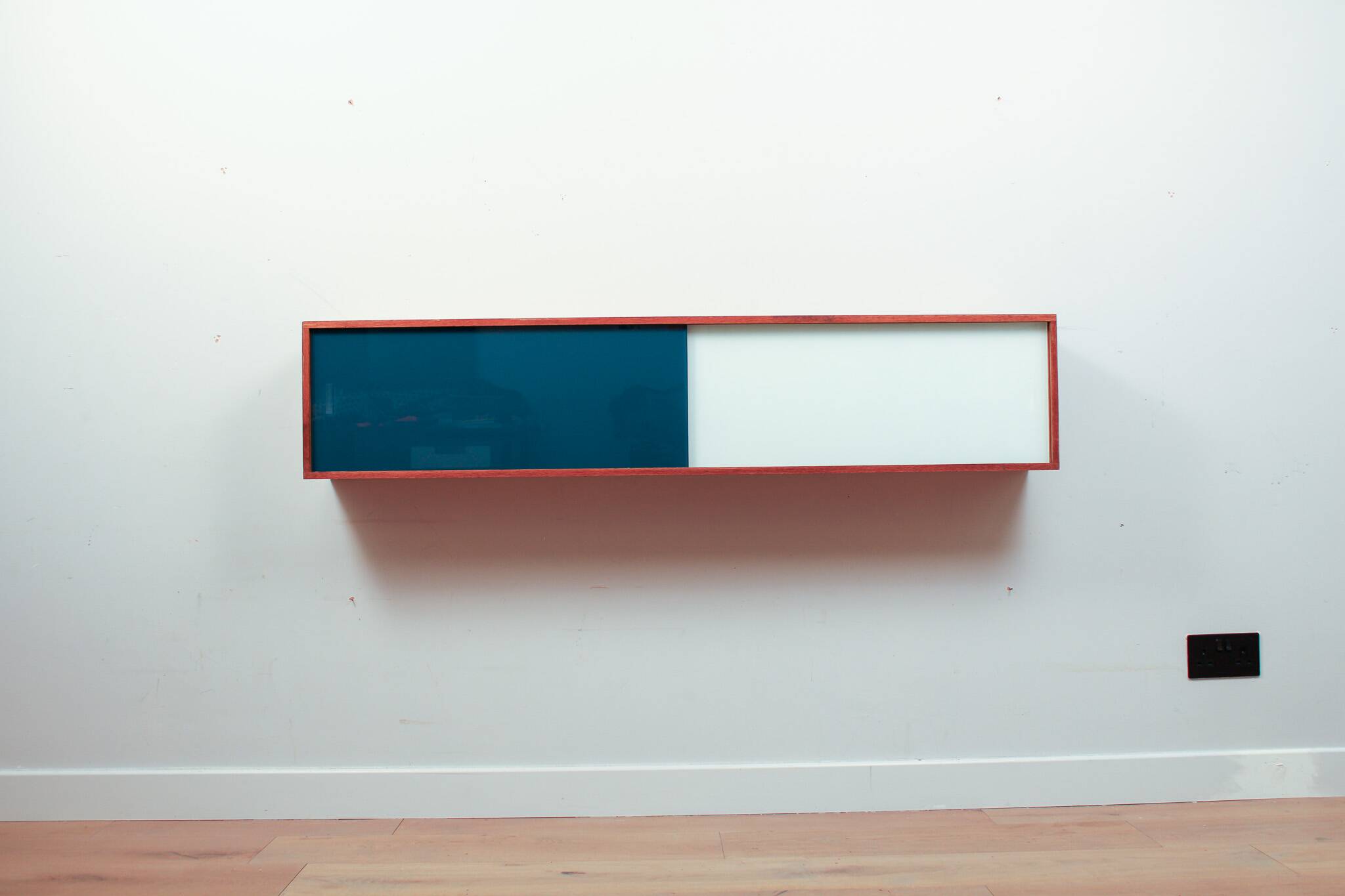 Vintage mid-century wall hung oak cabinets, blue & white sliding glass door