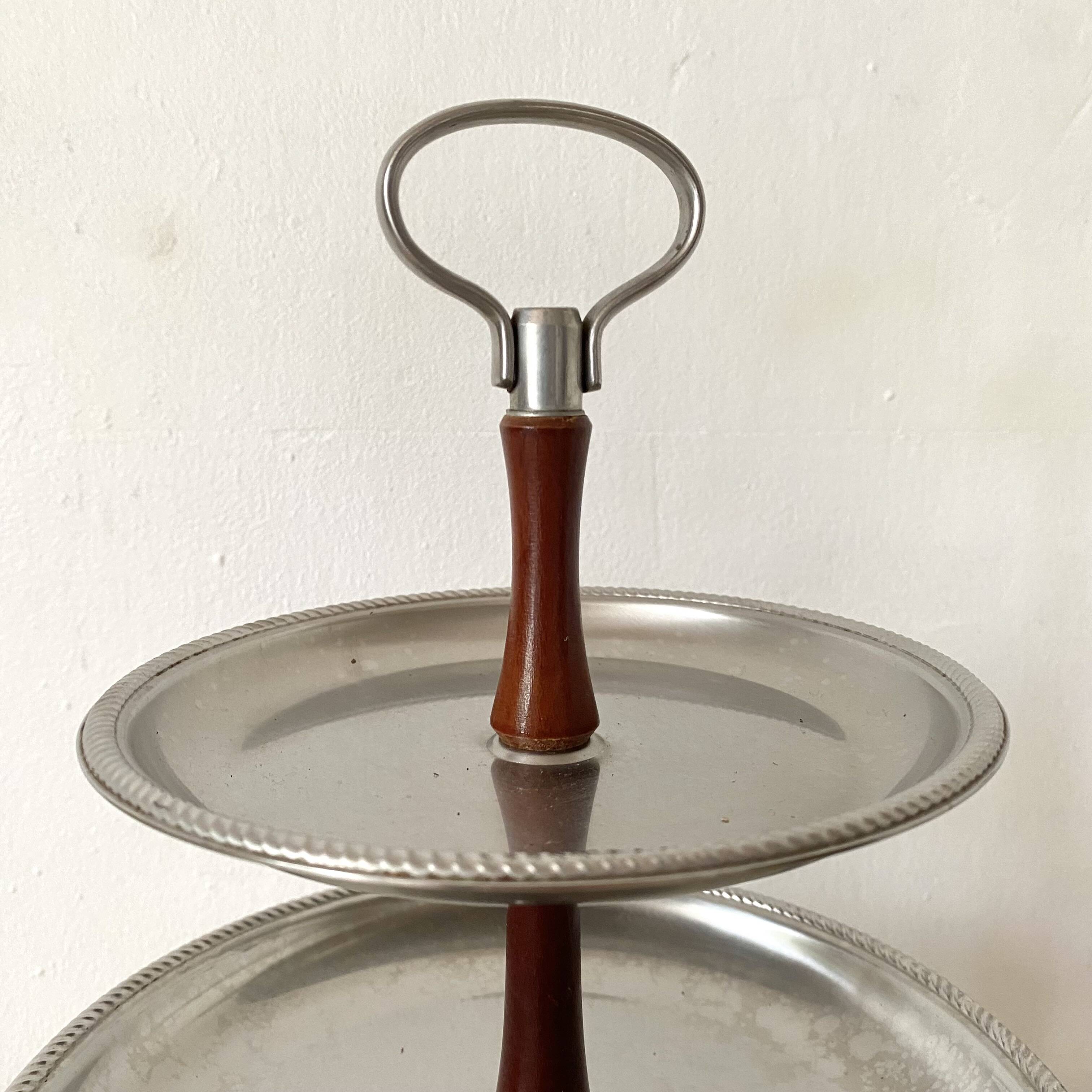 Vintage tiered display stand, stainless steel rotating server Alessi Fratelli