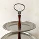 Vintage tiered display stand, stainless steel rotating server Alessi Fratelli