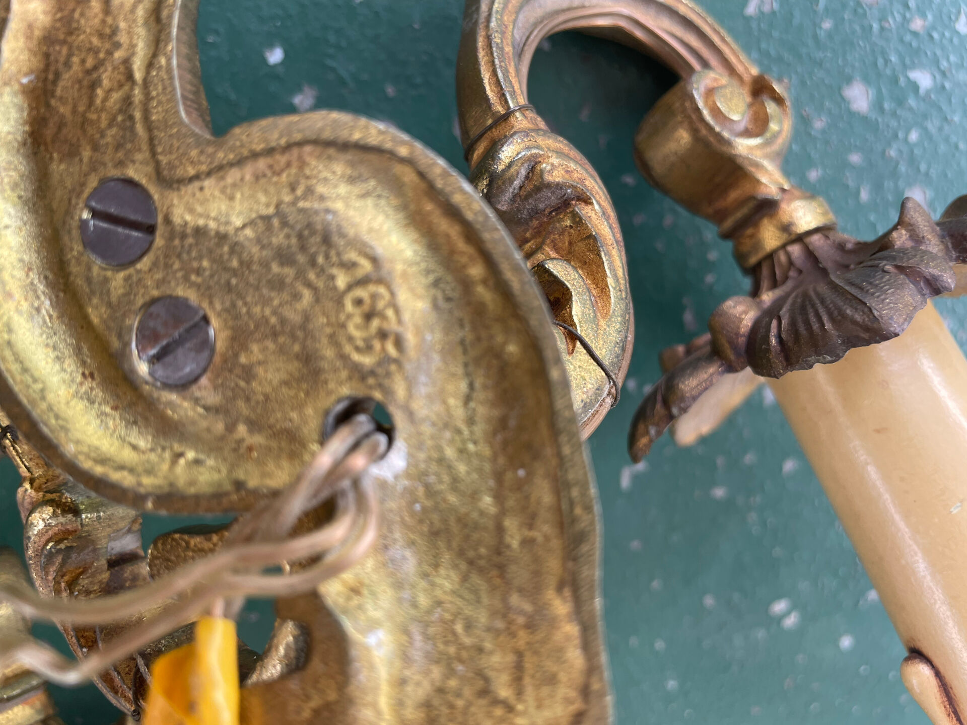Pair of bronze Art Nouveau wall sconces.