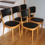 5 baumann chairs with large backs in black faux leather.