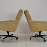 Pair of mid-century swivel armchairs with wheels 1970's