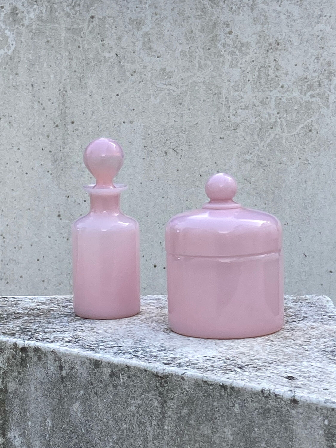 Two pink opaline bottles