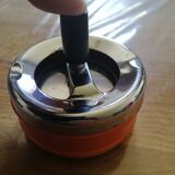 Vintage orange rotating ashtray