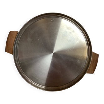 Large flat metal and wood platter in Scandinavian style.